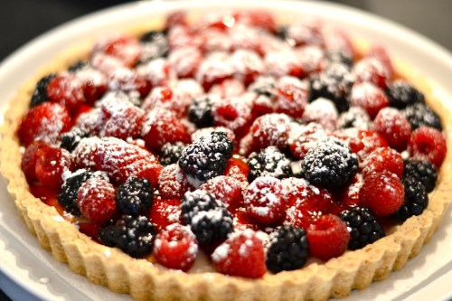 Non 4th of July version with berries sprinkled around, glazed and dusted.